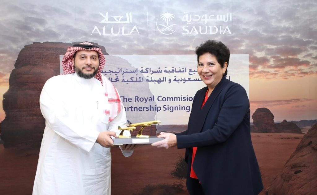 2- Ms. Melanie De Souza (RCU) and Mr. Hazem Sonbol (SAUDIA) exchanging gifts during the partnership signing ceremony on 26 January 2021 - 1